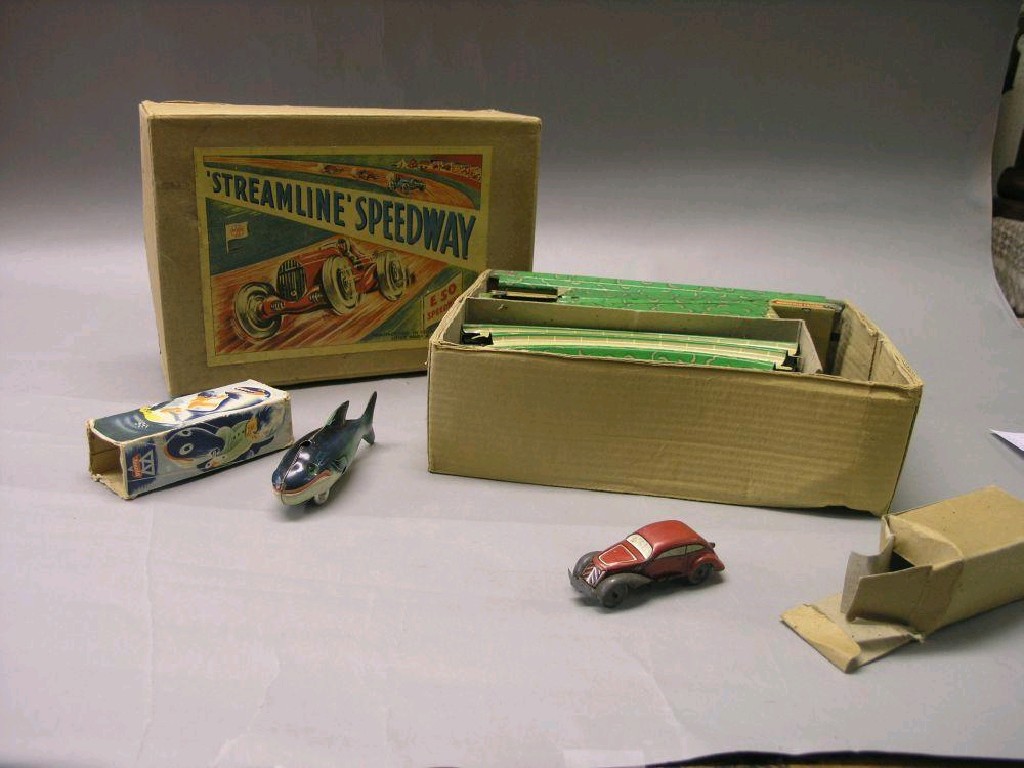 Appraisal: A Louis Marx Co 'Streamline Speedway' set including two tin-plate