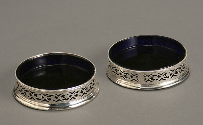 Appraisal: Pair of George III Reticulated Silver Bottle Coasters William Penn