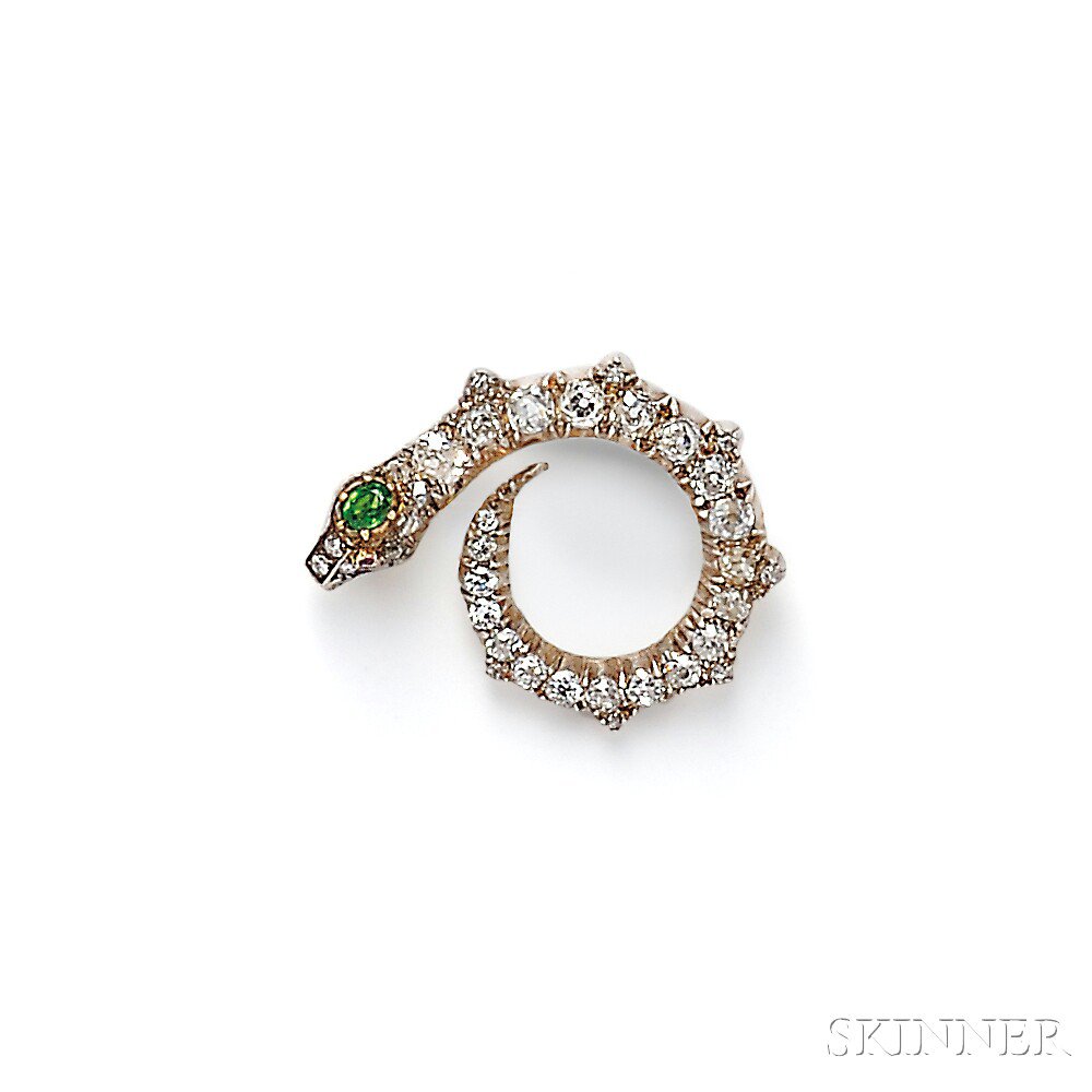 Appraisal: Demantoid Garnet and Diamond Snake Brooch with cushion-cut demantoid garnet