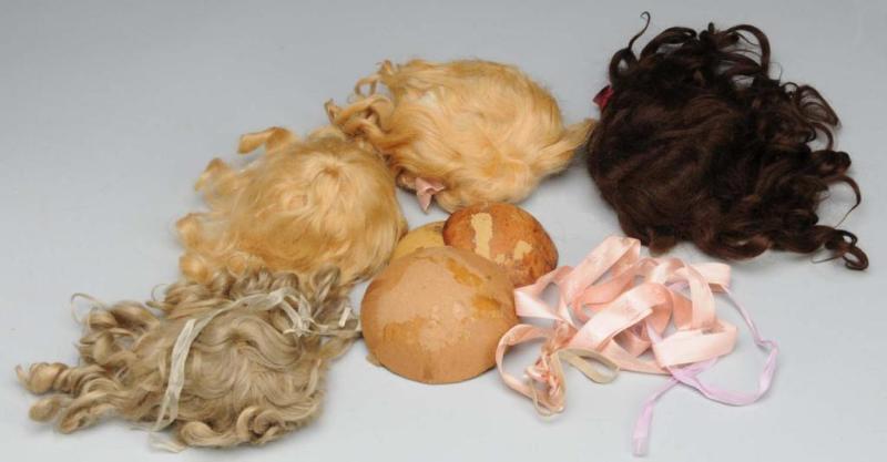 Appraisal: Lot of Mohair Wigs Description Three antique mohair wigs one