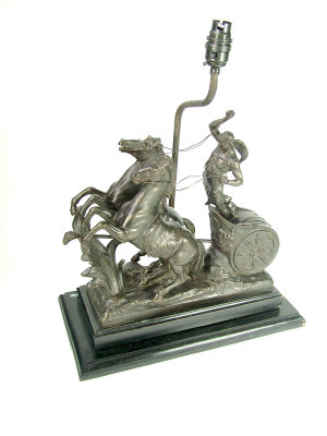 Appraisal: A pair of bronzed spelter models of charioteers length cm