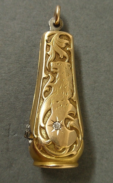 Appraisal: - Gold cigar cutter c with a diamond stud and