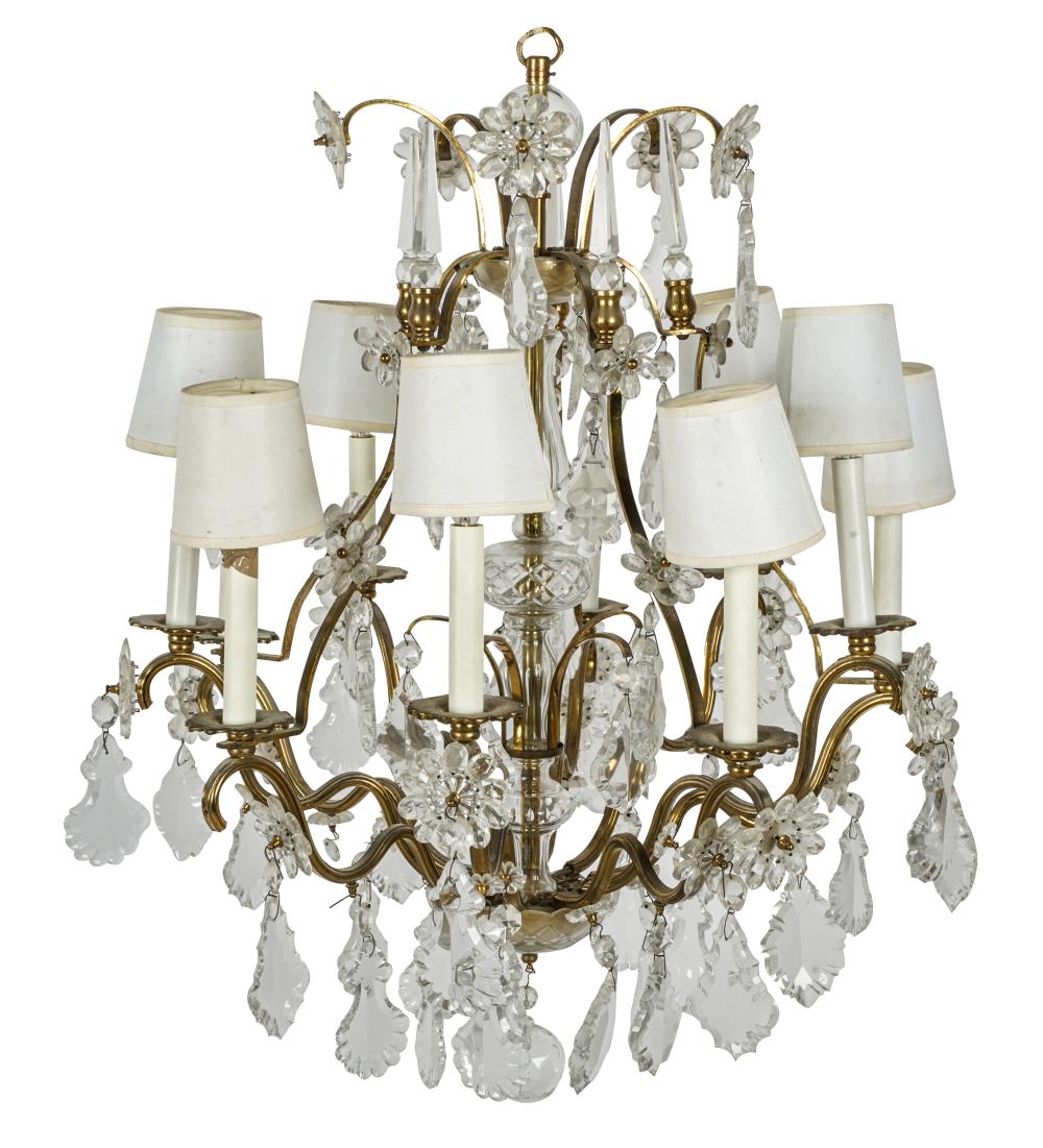 Appraisal: CRYSTAL GILT METAL TEN-LIGHT CHANDELIERCondition missing two paper shades inches