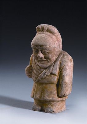 Appraisal: A Chinese unglazed pottery model of a dwarf Tang dynasty