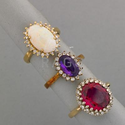 Appraisal: THREE JEWELED DIAMOND OVAL CLUSTER RINGS th C Opal Amethyst