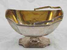 Appraisal: A Russian silver swing handle sugar bowl with gilt interior