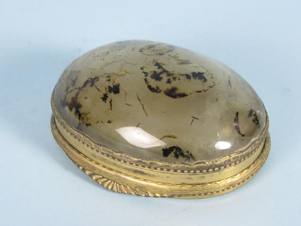 Appraisal: A moss agate type oval Box with gilt metal mounts