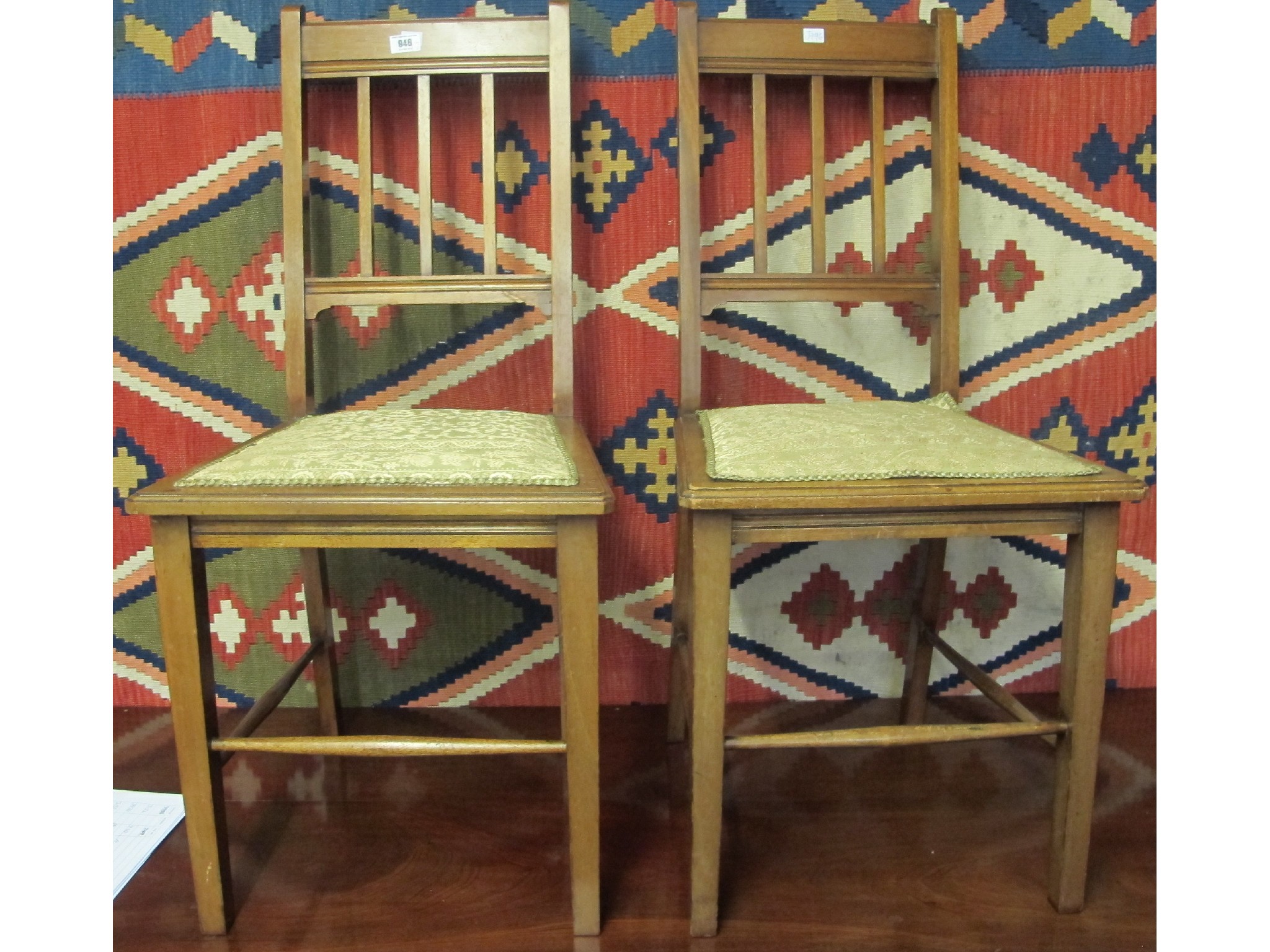 Appraisal: A pair of Edwardian bedroom chairs