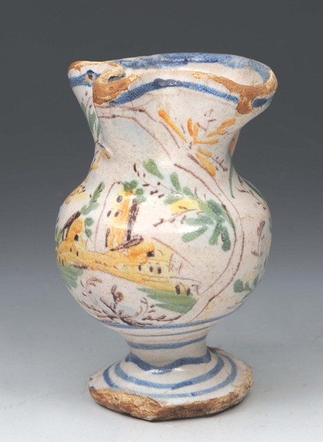 Appraisal: A SMALL ITALIAN TH CENTURY FAIENCE JUG decorated with castle