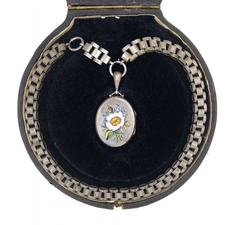 Appraisal: A VICTORIAN SILVER AND ENAMEL OVAL LOCKET AND COLLAR the