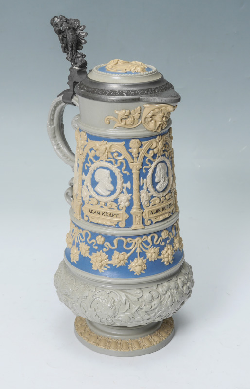 Appraisal: METTLACH RELIEF TANKARD Hinged lid with figural thumbpress relief decoration