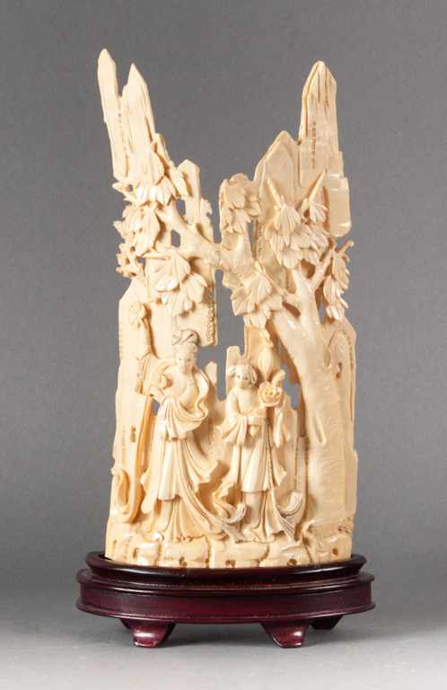 Appraisal: Japanese carved ivory figural group th century modeled as large