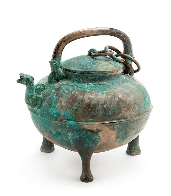 Appraisal: An Archaic Bronze Covered Wine Vessel He Diameter inches An