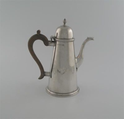 Appraisal: A modern coffee pot tapering form high domed cover knop