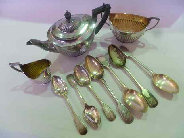 Appraisal: A SILVER PLATED THREE PIECE TEA SET of baluster form