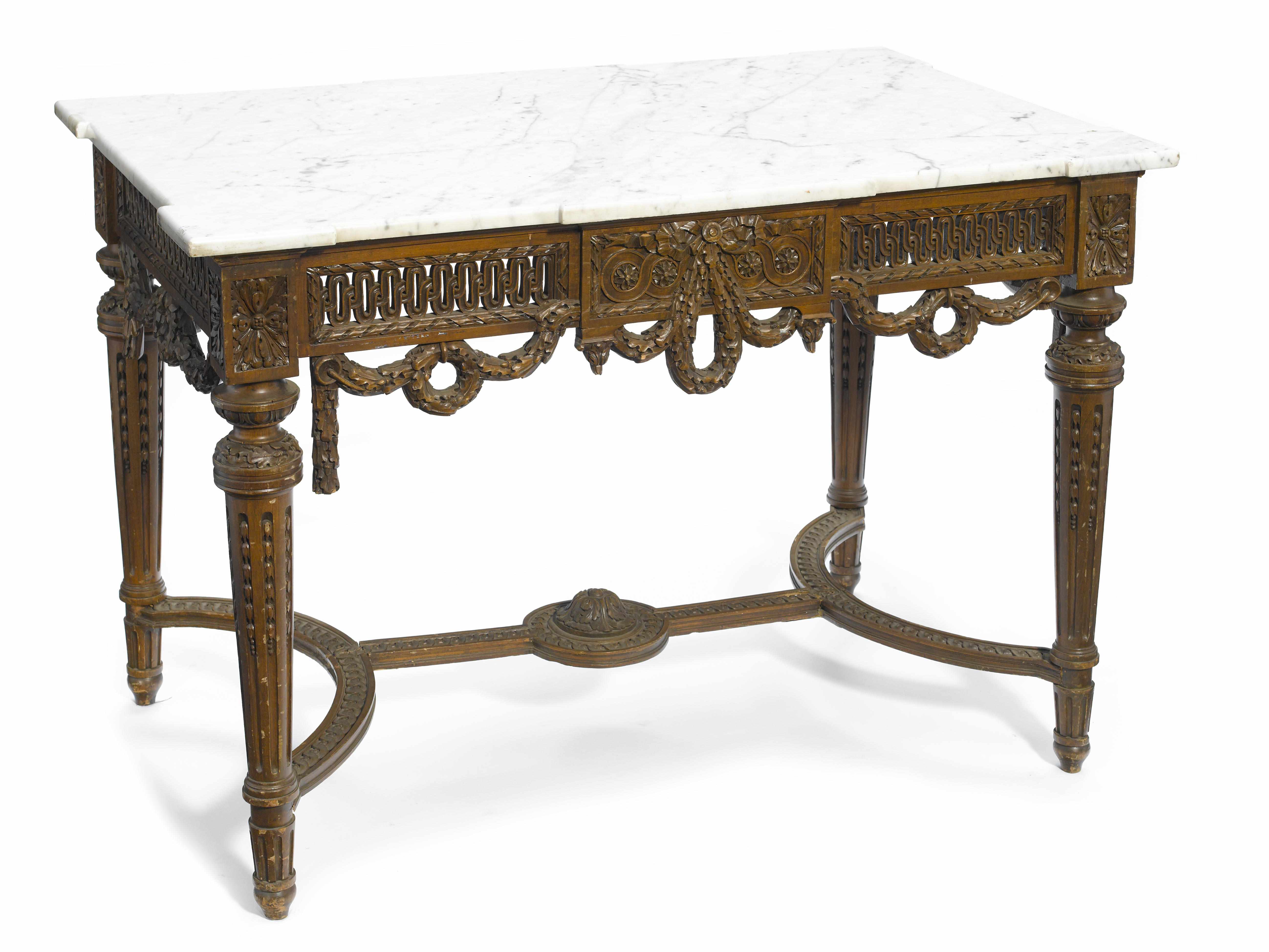 Appraisal: A Louis XVI style carved walnut table de milieu circa