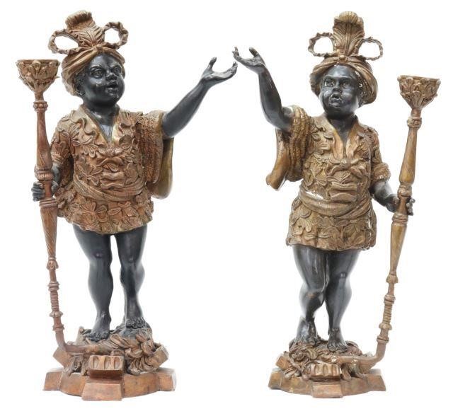 Appraisal: pair Patinated metal candle holders Blackamoor Figures each dressed in