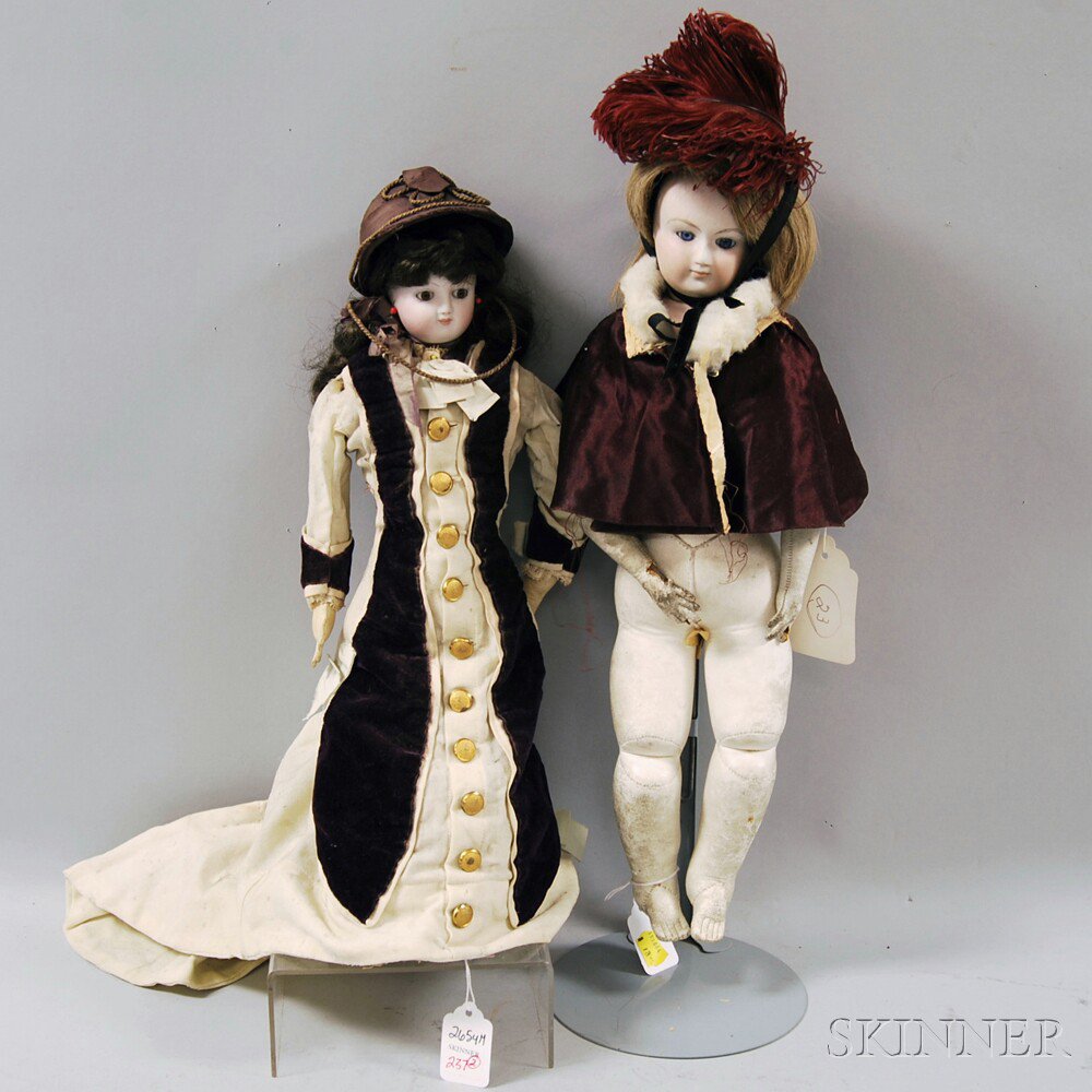 Appraisal: Two Bisque Head Lady Dolls later th century one with