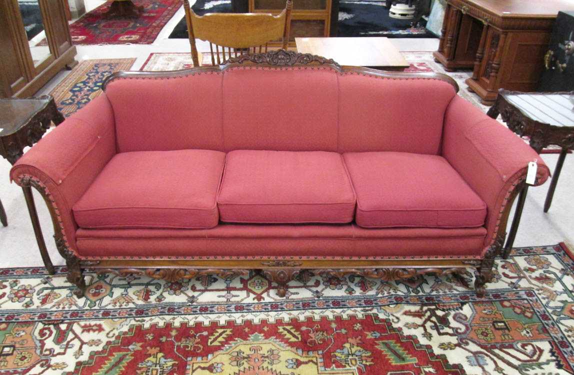 Appraisal: LOUIS XV STYLE SOFA American c s featuring a carved