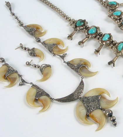 Appraisal: A NAVAJO SILVER AND BEAR CLAW NECKLACE AND EARRING SET