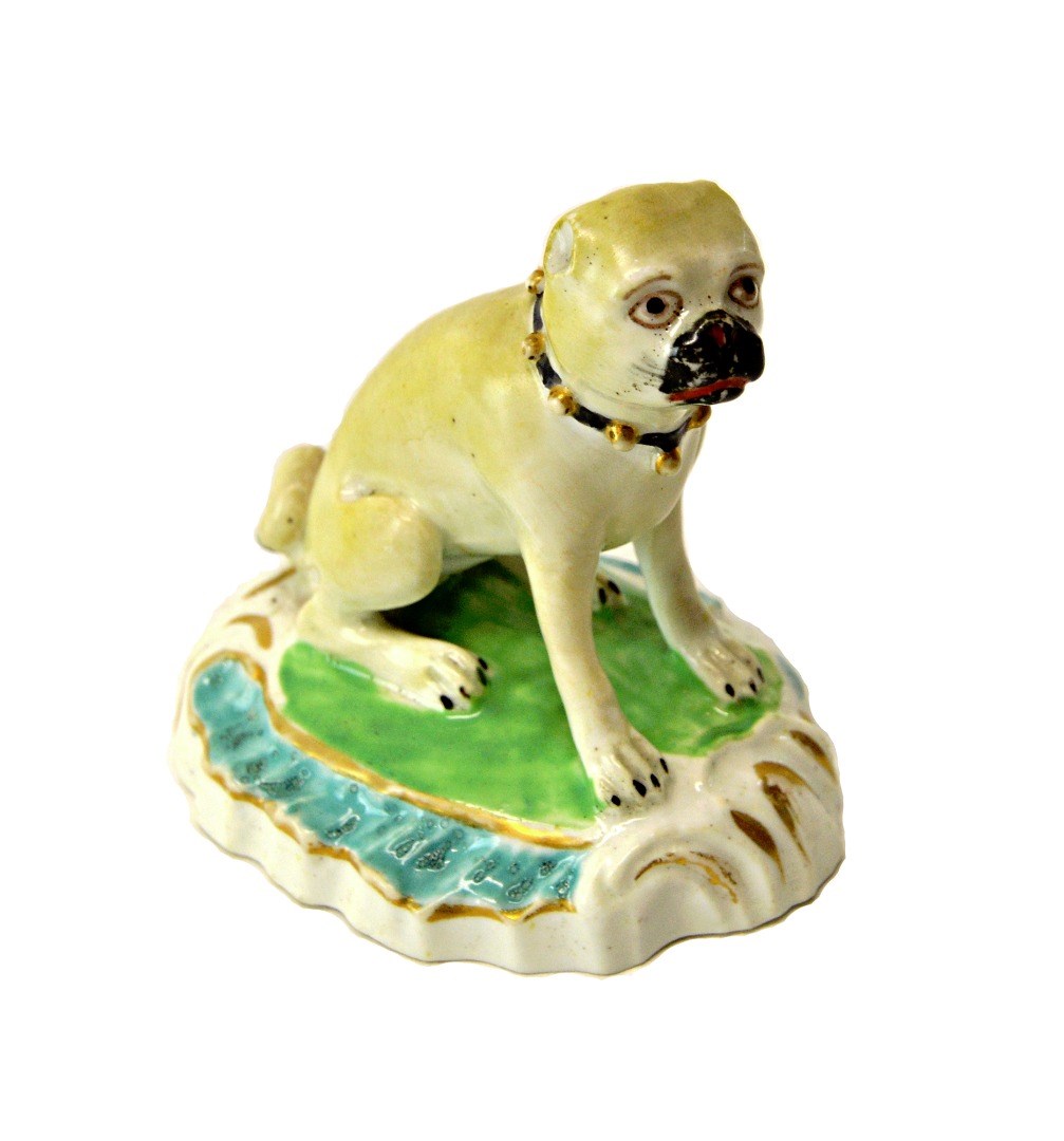 Appraisal: A Derby figure of a pug dog circa seated wearing