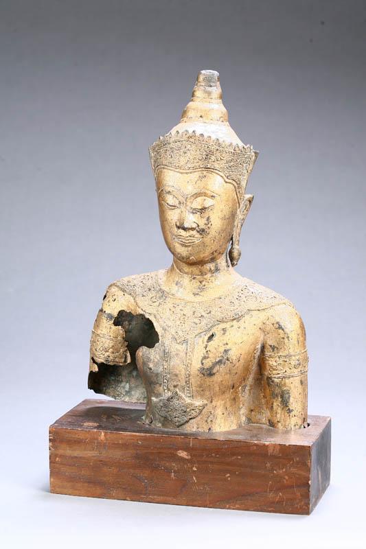 Appraisal: BUST OF BUDDHA Asian th century gilt bronze Fragment of