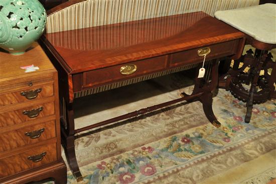 Appraisal: BAKER SOFA TABLE Mahogany with crossbanded top drop leaves two