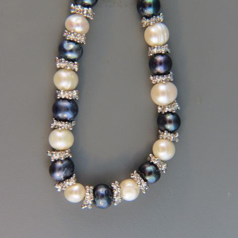 Appraisal: Pearl Necklace alternating black white pearls mm long slilver spacers