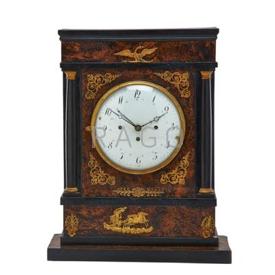 Appraisal: CONTINENTAL SHELF CLOCK Ebonized columns ormolu decoration time and strike