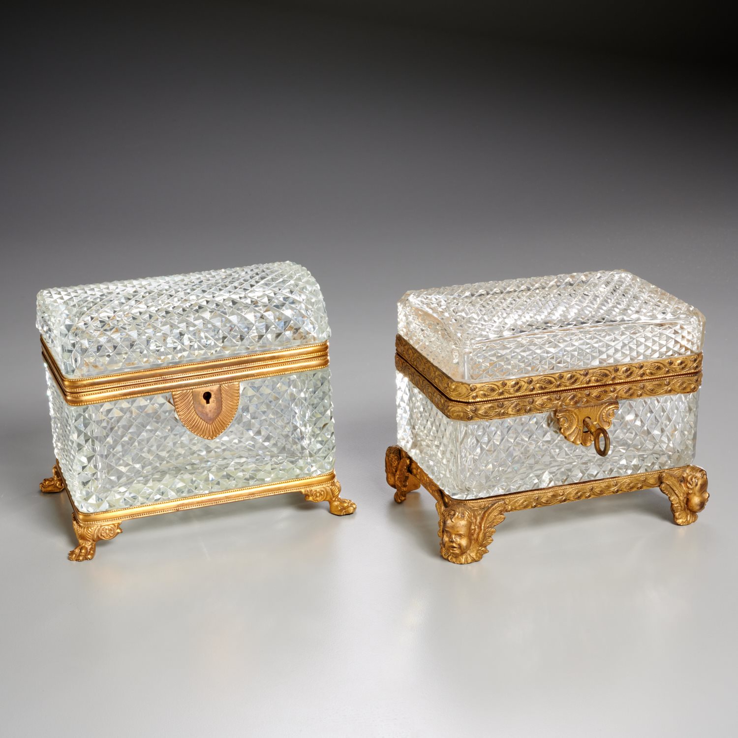 Appraisal: FRENCH CUT CRYSTAL JEWEL CASKETS th th c Baccarat style