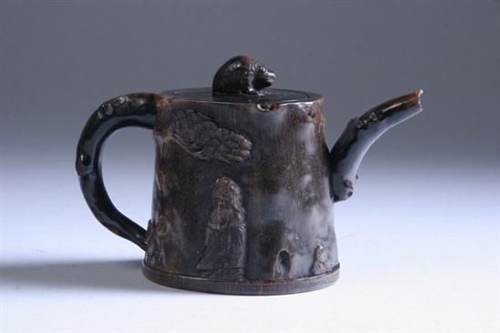 Appraisal: CHINESE RHINOCEROS HORN TEAPOT th century Carved to depict pine