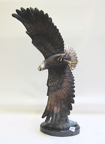 Appraisal: PATINATED BRONZE WILDLIFE SCULPTURE an American bald eagle in flight