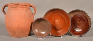 Appraisal: Four Pieces of Antique redware Pottery Double handled storage crock