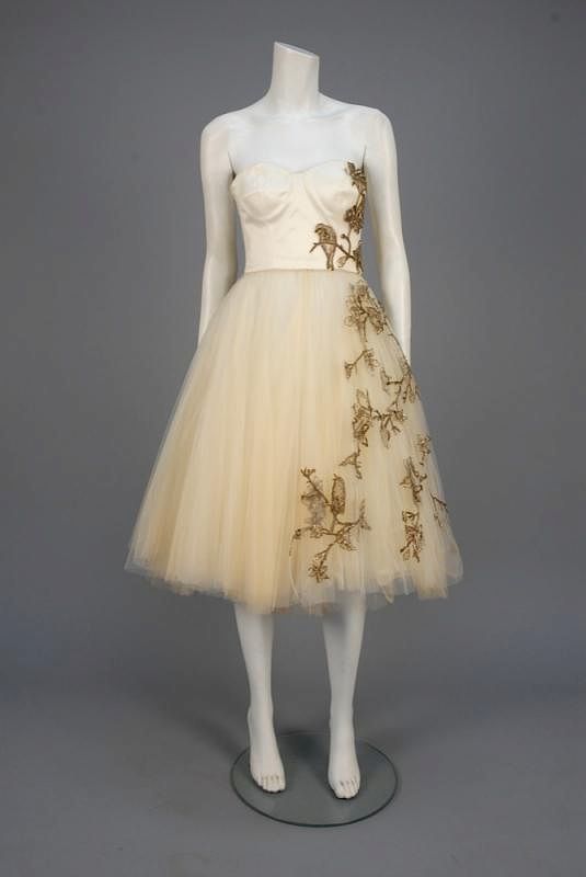 Appraisal: ALEXANDER McQUEEN METALLIC EMBROIDERED STRAPLESS DRESS SPRING White silk bustier