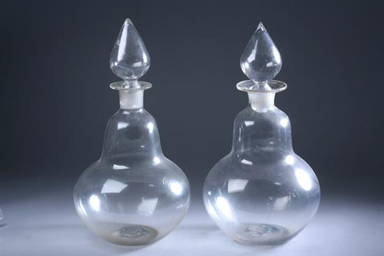 Appraisal: PAIR HAND-BLOWN CLEAR GLASS APOTHECARY JARS AND STOPPERS th- th