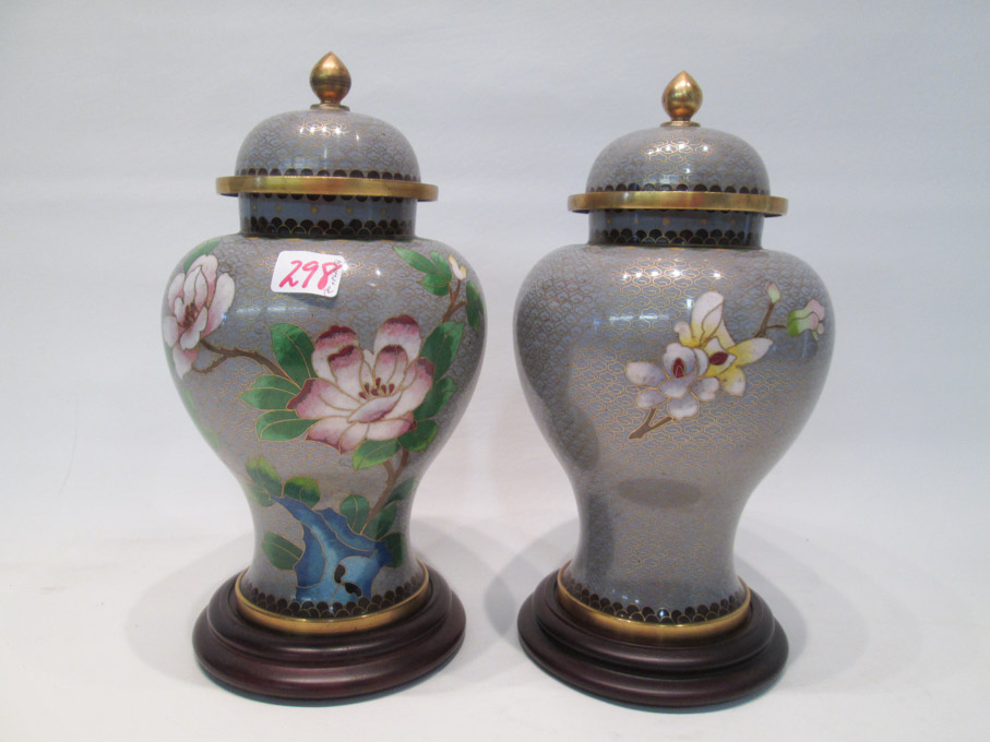 Appraisal: PAIR CHINESE CLOISONNE LIDDED JARS with floral and bird motif