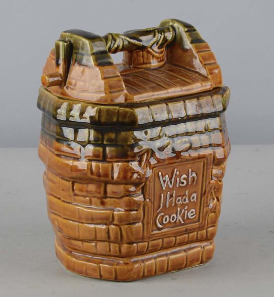 Appraisal: McCoy Wishing Well Cookie Jar Brown glazed cookie jar reads