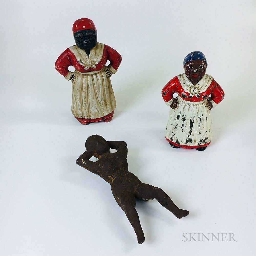 Appraisal: Two Polychrome Cast Iron Figural Doorstops and a Naughty Nellie