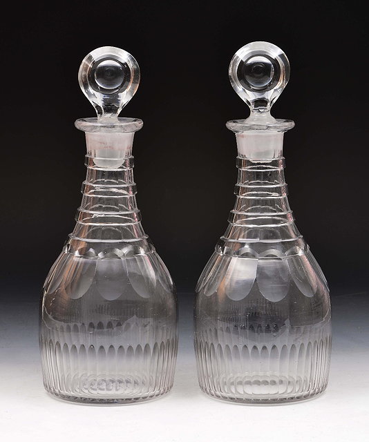 Appraisal: Pair of George III glass fluted decantersand stoppers cm high