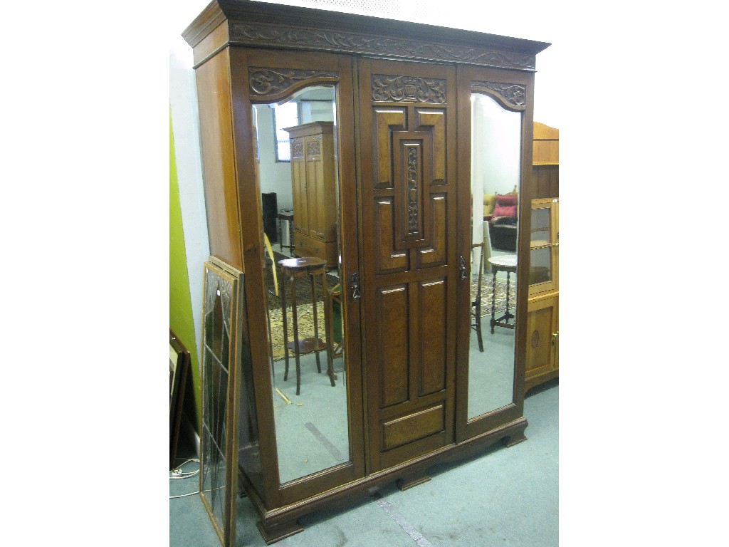 Appraisal: Victorian walnut double mirrored door section wardrobe