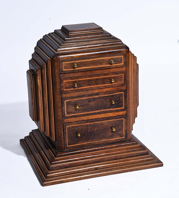 Appraisal: A 'S OAK 'ODEON' STYLE TABLE TOP CHEST OF DRAWERS