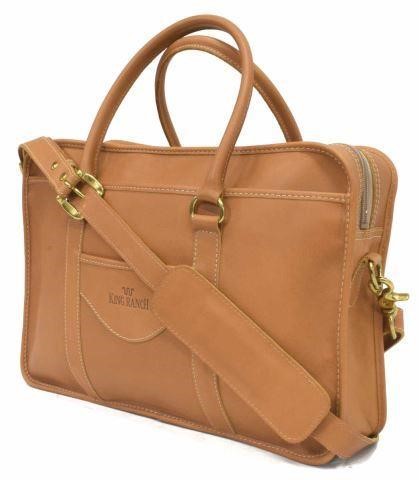 Appraisal: King Ranch leather overnight shoulder bag having brass hardware King