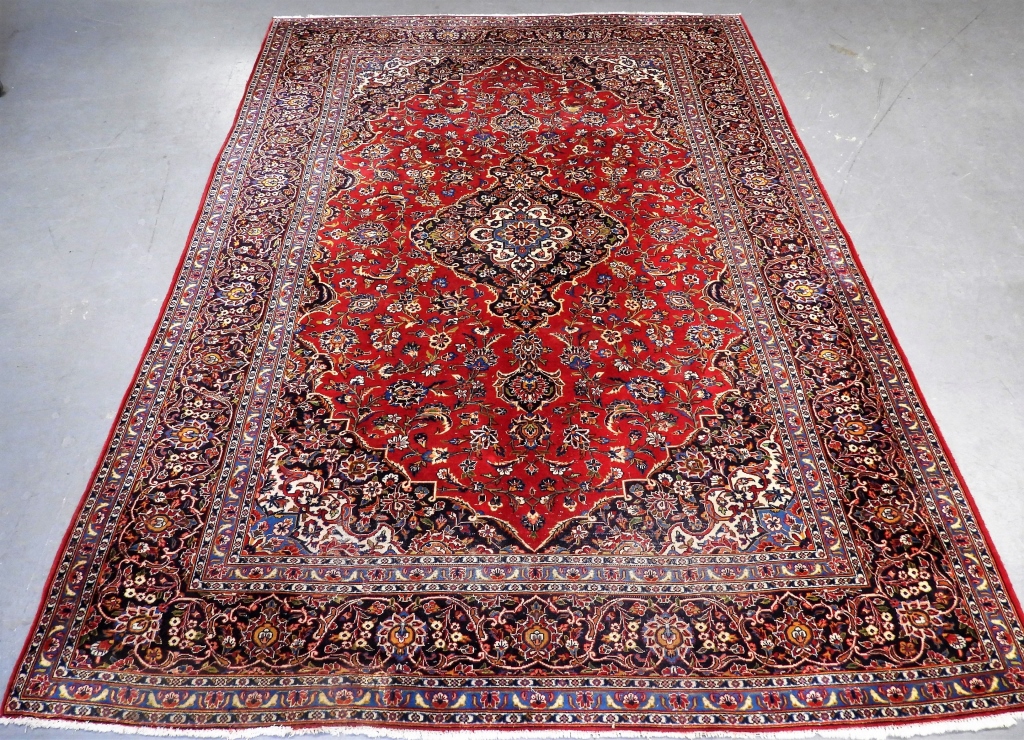 Appraisal: MIDDLE EASTERN RED HANDMADE RUG Middle East th CenturyNavy ivory