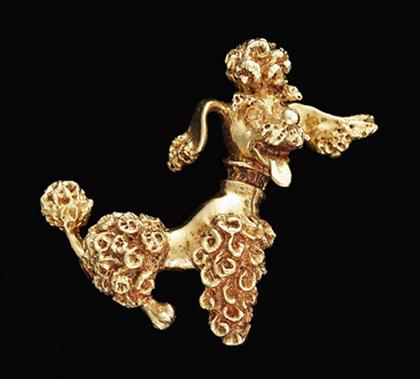 Appraisal: karat yellow gold poodle pin Yellow gold seated poodle pin