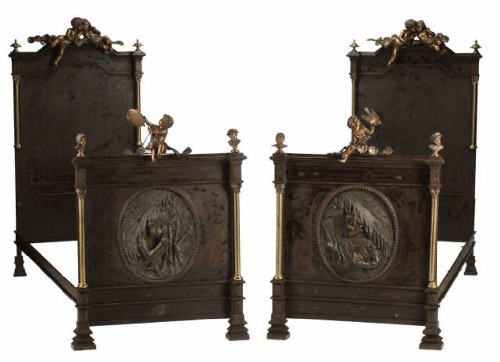 Appraisal: pair Exceptional bronze mounted iron beds crested by large robust