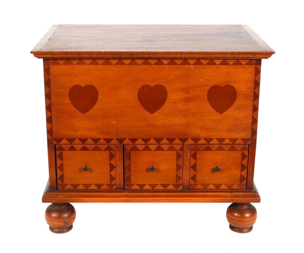 Appraisal: Child's blanket chest with maple and cherry inlay three hearts