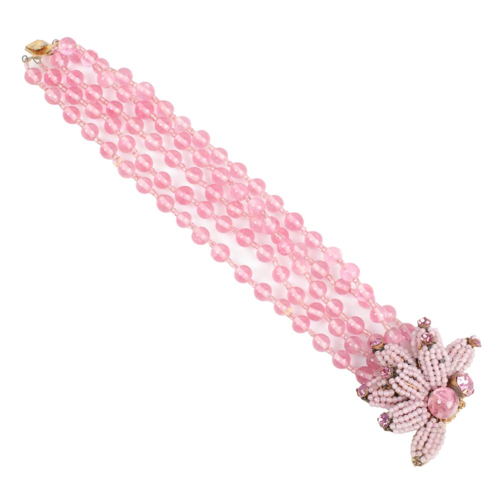 Appraisal: MIRIAM HASKELL MULTI-STRAND PINK GLASS BEAD BRACELET WITH L BRACELET