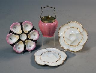 Appraisal: Three oyster plates and a pink biscuit jar two Haviland