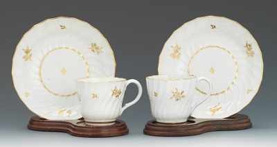 Appraisal: A Pair of British Porcelain Cups and Saucers A pair