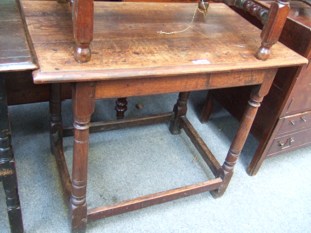 Appraisal: A late th century oak side table the moulded rectangular